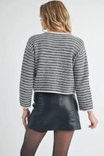 Round neck cardigan with gold buttons and black leather skirt set