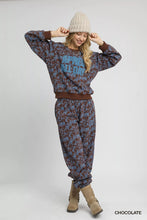 Chocolate-colored umgee scenic print casual sweatshirt and print casual sweatpants set with blue floral pattern