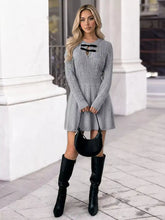 Gray ribbed cable knit A-line sweater dress with black velvet neckline tie