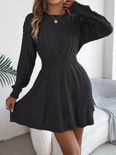Black cable-knit long sleeve sweater dress with flared skirt