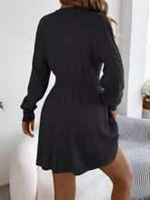 Black ribbed cable-knit long sleeve sweater dress