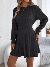 Black cable-knit long sleeve sweater dress with ribbed detailing