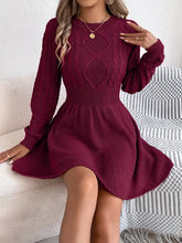 Cable knit long sleeve sweater dress in maroon with fitted waist and flared skirt