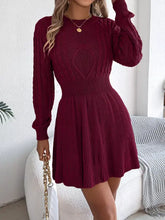 Maroon cable-knit long sleeve sweater dress with heart pattern bodice