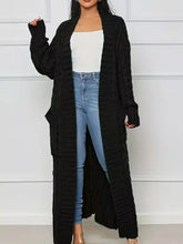 Black cable knit longline cardigan in earth tone, machine wash cold