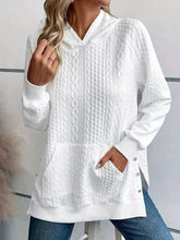 White cable texture hoodie with button details on side pockets made of slightly stretchy fabric machine wash cold
