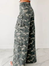 High-waisted wide leg cargo jeans in faded gray and beige camo print with multiple cargo pockets