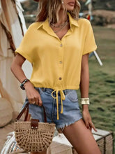 Yellow short-sleeved casual button drawstring hem shirt with drawstring waistband for relaxed wear