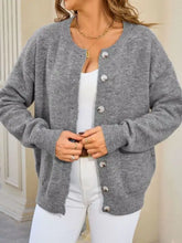 Gray earth tone knit cardigan with silver buttons, round neckline