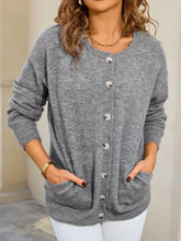Gray earth tone knit cardigan with silver buttons, pockets, slightly stretchy