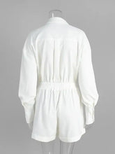 White long-sleeved romper with collar, elastic waist, machine wash cold