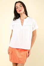 Casual fit white nochted short sleeve top with orange cargo mini skirt
