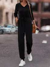 Black long-sleeved v-neck drawstring jumpsuit, machine wash cold, tumble dry low