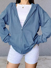 Casual loose zip-up hoodie in soft light blue with relaxed fit and front pockets machine wash cold recommended