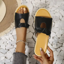 Black casual open toe cutout sandals with buckle and ruffle detail