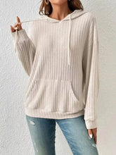 Beige casual ribbed knit hoodie with drawstring hood and front pocket machine wash cold for easy care