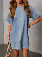 Light blue denim dress with short slightly flared sleeves and relaxed fit casual short sleeve denim design