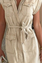 Beige denim mini dress with front zipper multiple pockets and tied waist belt casual tie waist denim mini dress