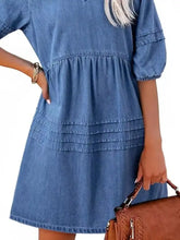 Blue denim mini dress with v-neck, short puffed sleeves, and tiered ruffles perfect casual denim mini dress