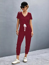 Maroon v-neck short-sleeve jumpsuit with white drawstring waist, machine wash cold