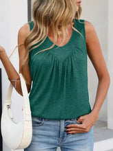 A soft emerald green casual v neck tank with a flattering v neckline and subtle gathered bust detailing