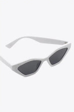 White cat-eye polycarbonate sunglasses with black lenses and silver hardware