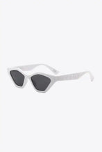 Cat eye polycarbonate sunglasses in tortoiseshell with white geometric accents