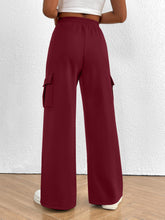 Maroon casual high waist cargo pants with wide-leg fit elastic waistband and side pockets for comfortable wear