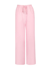 Soft pink tied wide leg pants with elastic waist and matching drawstring for comfortable casual wear