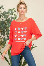 Loose-fitting red full-size heart graphic long sleeve T-shirt