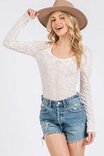 Ces Femme velvet floral cream-colored long sleeve lace bodysuit with a subtle floral pattern and elegant sleeve design
