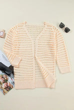 Peach openwork open front cardigan with slightly stretchy knit texture