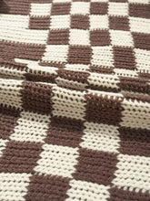 Cozy checkerboard pattern sweater cardigan with knitted blanket texture