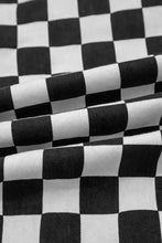 Black and white checkerboard print cropped jeans with woven texture distressed details and raw edges