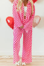 Pink and white checkerboard print long sleeve top and pants set