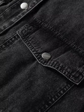 Black raw hem denim shirt dress with chest pocket and silver buttons featuring stitched pocket details