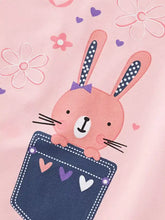 Pink bunny peeking from navy blue denim pocket on kids round neck t-shirt