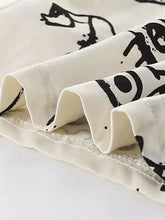 Children’s excavator print cream cotton t-shirt, machine wash cold