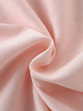 Soft blush pink cotton T-shirt with cute cartoon flower print, machine wash cold