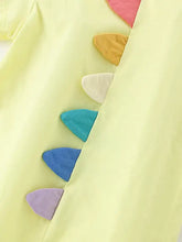 Pale yellow kids dress with cartoon monster spikes, machine wash cold