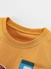 Mustard yellow kids truck graphic t-shirt with blue black patch pocket