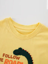 Children’s round neck dinosaur t-shirt with follow the road text