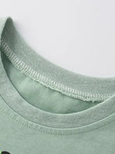 Light green ribbed crew neck childrens dinosaur graphic short sleeve t-shirt