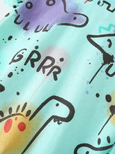 Turquoise dinosaur print crew neck t-shirt with playful spray-painted dinosaurs