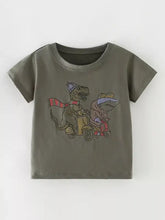 Olive green round neck toddler t-shirt with dinosaurs on scooters