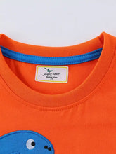 Bright orange kids t-shirt with blue dinosaur applique and ribbed collar