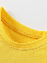 Bright yellow childrens fire truck graphic tee in natural cotton