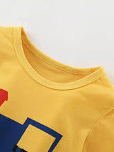 Yellow short-sleeve childrens t-shirt with train graphic, machine wash cold