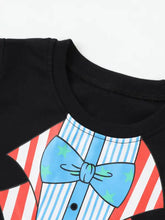 Black toddler magician costume graphic t-shirt with blue bow tie, stars, stripes. Machine wash cold