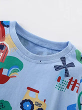 Light blue crew neck kids t-shirt with farm print tractors barns